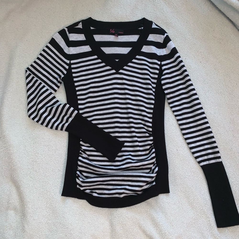 Very nice black and grey striped sweater.